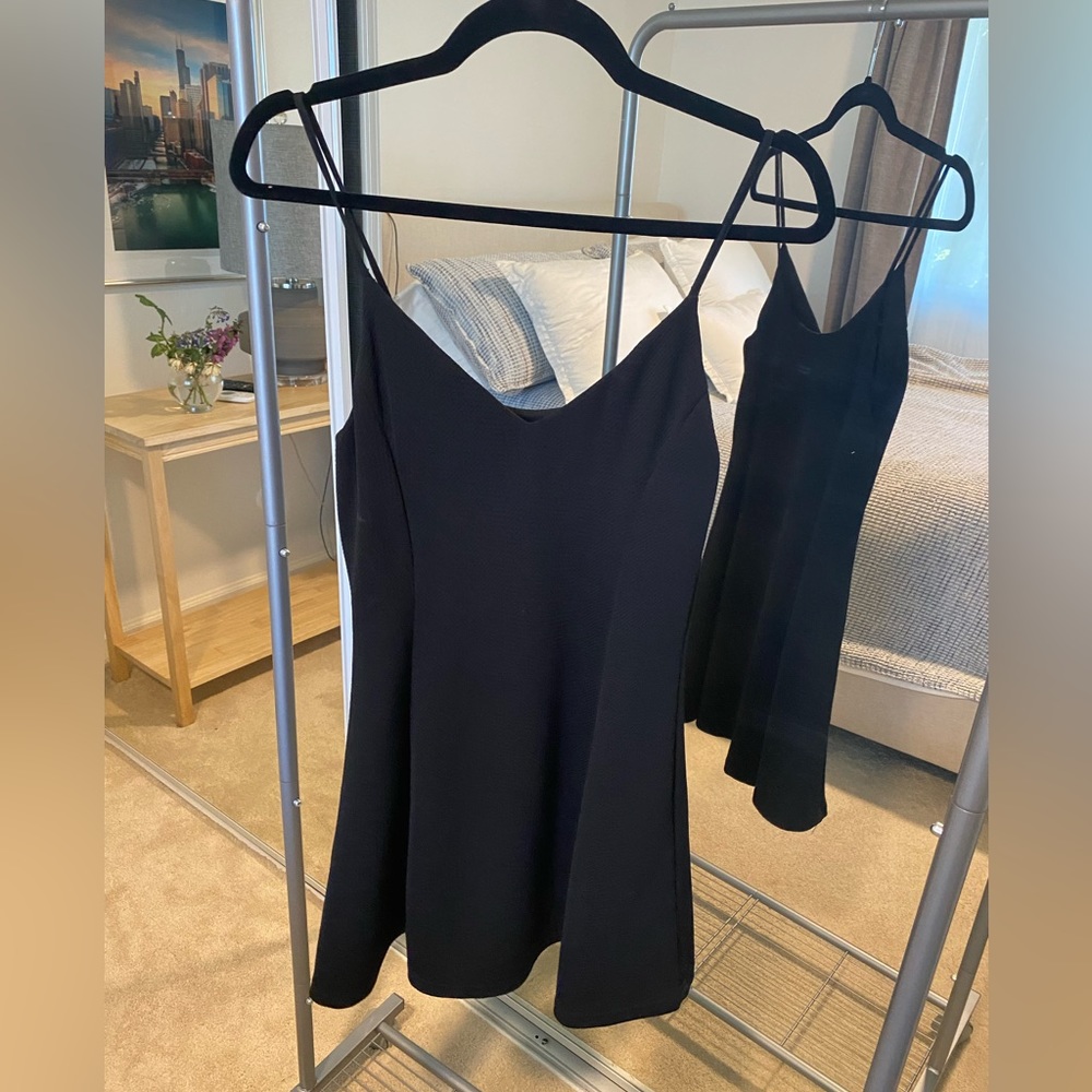 Black stretch knit skater dress, never worn